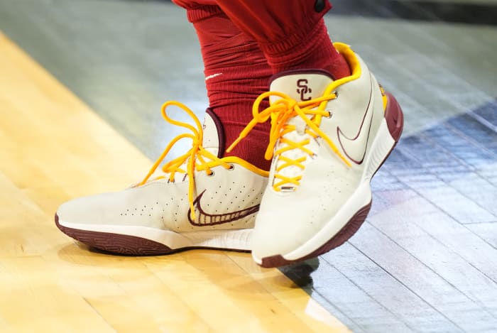 USC Trojans guard Bronny James' white and cardinal Nike sneakers.